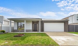 Modern single-storey brick home with double garage