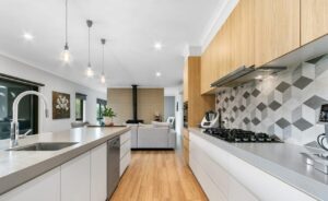 Modern open-plan kitchen with timber cabinets and island