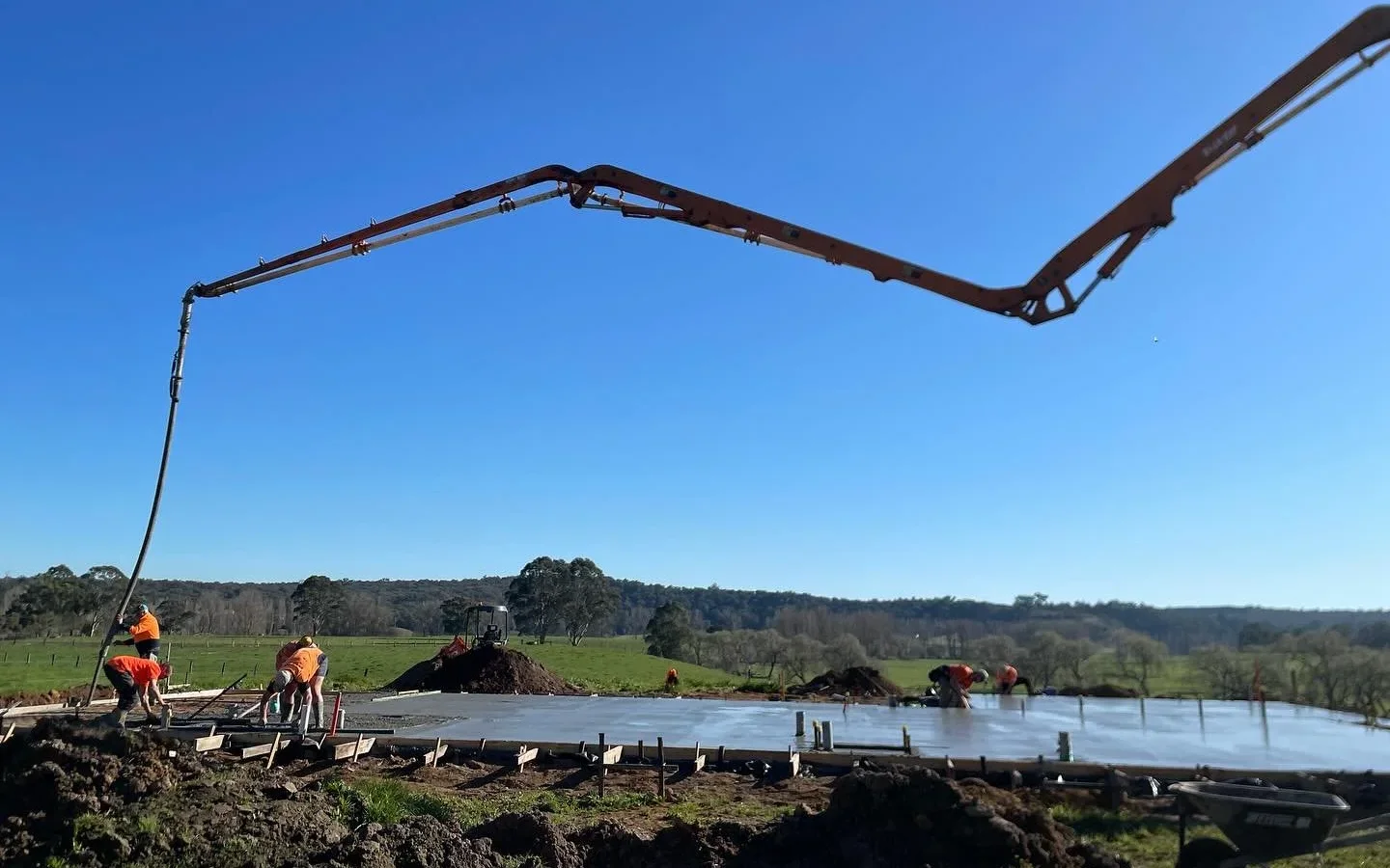 Concrete slab poured on rural construction site